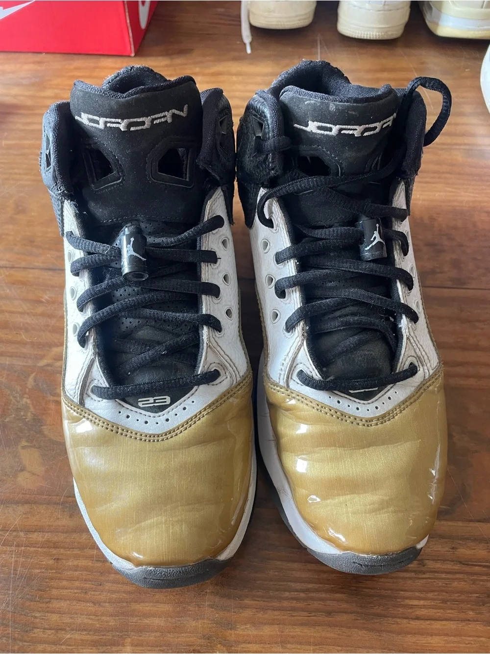Nike Air Jordans High-Top Sneakers - Black White Gold, Size 7 Y casual athletic